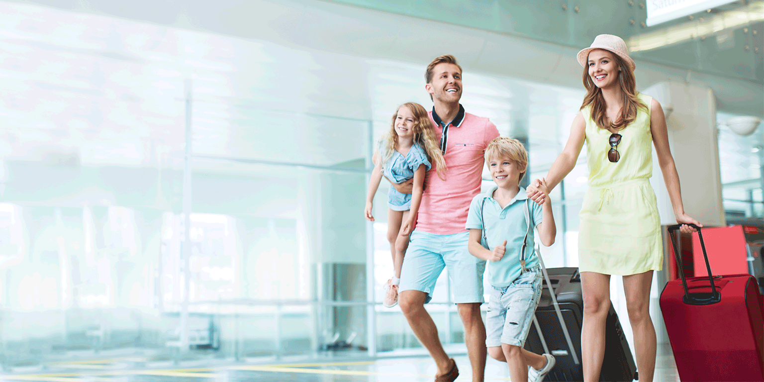 Family walking in airport terminal Family walking in airport terminal